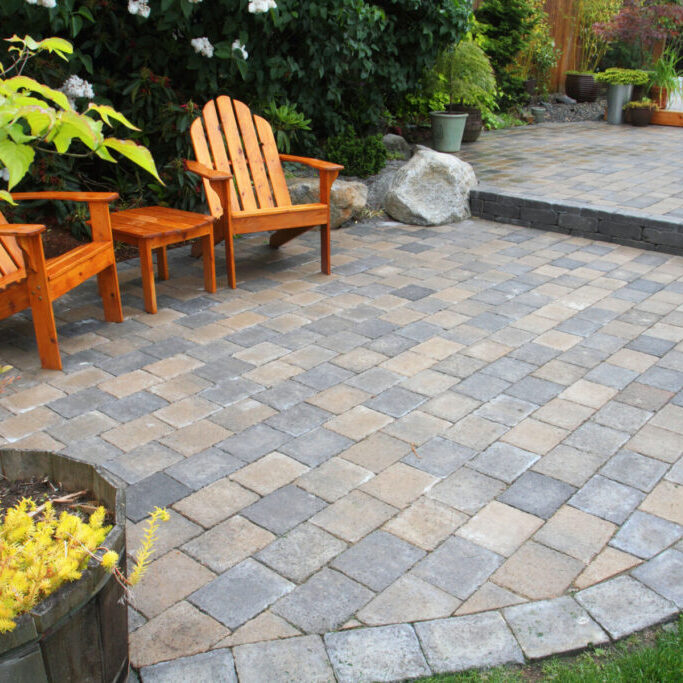 Paver patio with wooden chairs