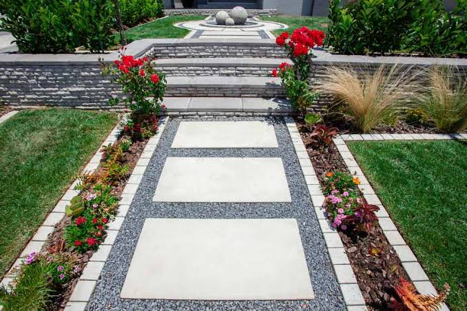 Modern stepping stone walkway with landscaped borders
